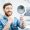 Portrait of a handsome bearded man with healthy smile in the dental office